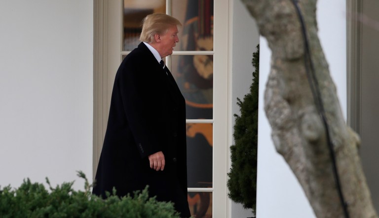 President Donald Trump walks on the Colonnade outside the Oval Office upon arrival at the White House in Washington, Thursday, Feb. 1, 2018.