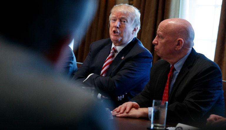 Rep. Kevin Brady, R-Texas, listens as President Trump speaks during a meeting with lawmakers about trade policy in the Cabinet Room of the White House, Tuesday, Feb. 13, 2018, in Washington.