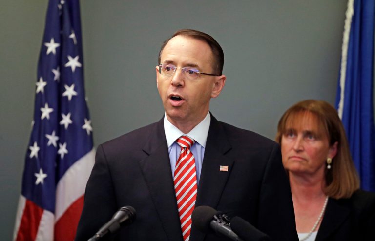 Deputy Attorney General Rod Rosenstein, left, speaks as U.S. Attorney for the Western District of Washington Annette L. Hayes looks on at a news conference giving an update on the unsolved 2001 slaying of a federal prosecutor, Wednesday, Feb. 21, 2018, in Seattle. Rosenstein joined other federal officials to discuss the killing of Assistant United States Attorney Thomas Wales. Federal authorities are offering up to $1.5 million for information about the unsolved 2001 slaying of Wales, an 18-year veteran of the U.S. Attorney's Office in Seattle, who was shot as he worked in the basement of his home on Oct. 11, 2001.