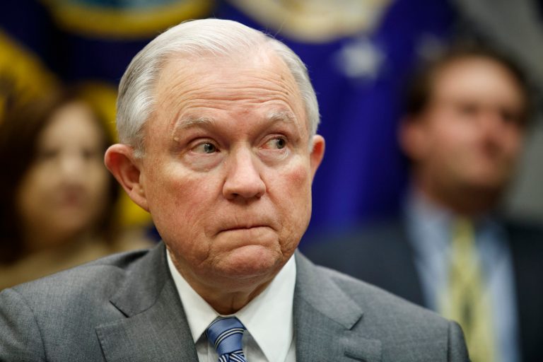 Attorney General Jeff Sessions listens during a meeting between President Donald Trump and state and local officials to discuss school safety, in the Roosevelt Room of the White House, Thursday, Feb. 22, 2018, in Washington.