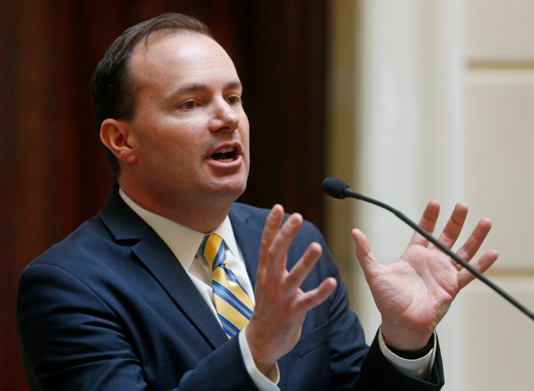 Sen. Mike Lee, R-Utah, speaks on the Senate Floor, Thursday, Feb. 22, 2018, at the Utah state Capitol in Salt Lake City. Lee says there's no way to ban or buyback AR-15-style assault rifles like the kind used by a shooter at a Florida high school last week without also banning hunting rifles.
