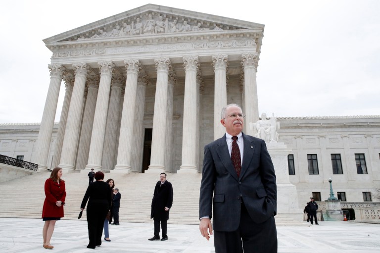 Illinois government employee Mark Janus walks outside the Supreme Court in Washington, D.C. The Supreme Court is taking up a case that could deal a painful financial blow to organized labor. The court is considering a challenge to an Illinois law that allows unions representing government employees to collect fees from workers who choose not to join.