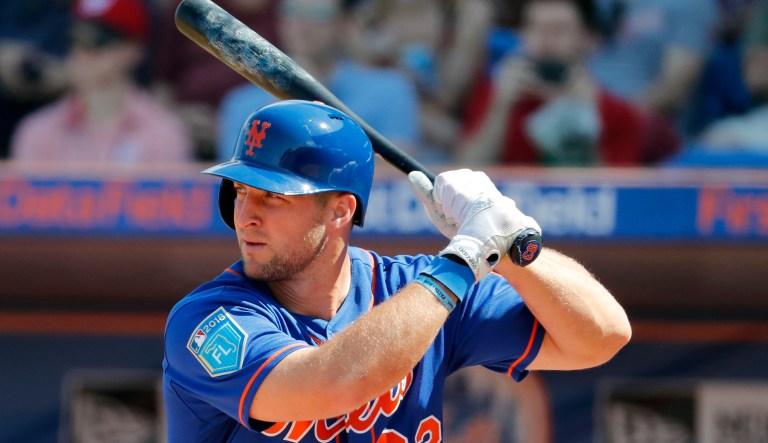 New York Mets' Tim Tebow bats during the second inning of an exhibition spring training baseball game against the Washington Nationals.
