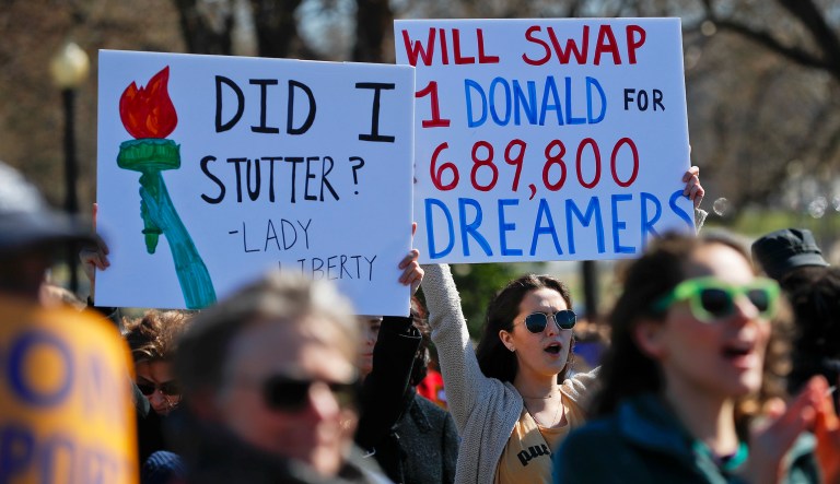 Immigration advocates from the American Civil Liberties Union, Union We Dream, MoveOn and others demonstrate during the announcement of a new campaign targeted at President Trump's immigration policies, in front of the White House in Washington, Sunday, March 4, 2018. 