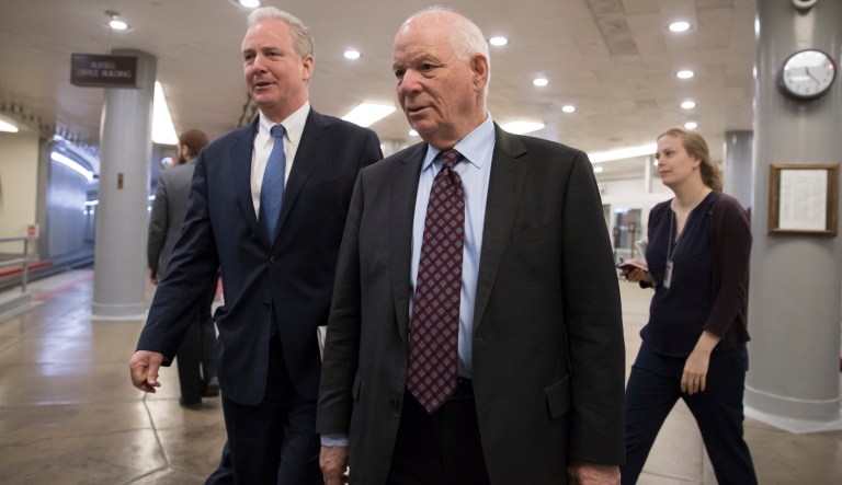 Sen. Chris Van Hollen, D-Md., left, and Sen. Ben Cardin, D-Md., arrive for a procedural vote as the Senate moves to pass legislation that would roll back some of the safeguards Congress put into place after a financial crisis rocked the nation's economy ten years ago, at the Capitol in Washington, Tuesday, March 6, 2018.