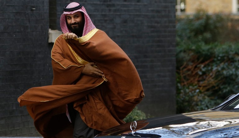 Saudi Arabia's Crown Prince Mohammed bin Salman walks to meet British Prime Minister Theresa May outside 10 Downing Street in London.