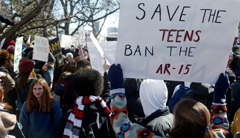 Hundreds of students protesting gun violence march to the Minnesota State Capitol in St. Paul, Minn.
