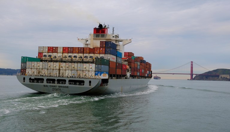 A pair of container ships make their way toward the Golden Gate Bridge and out to the Pacific Ocean Wednesday, March 7, 2018, in San Francisco.