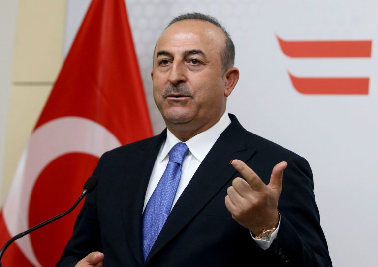 Turkey's Foreign Minister Mevlut Cavusoglu addresses the media after their talks with Austrian Foreign Minister Karin Kneissl at the foreign ministry in Vienna, Austria, Thursday, March 8, 2018. 