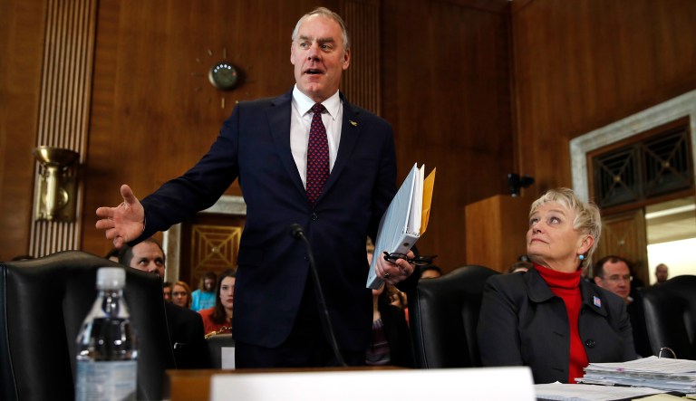 Interior Secretary Ryan Zinke arrives to testify before the Senate Committee on Energy and Natural Resources.