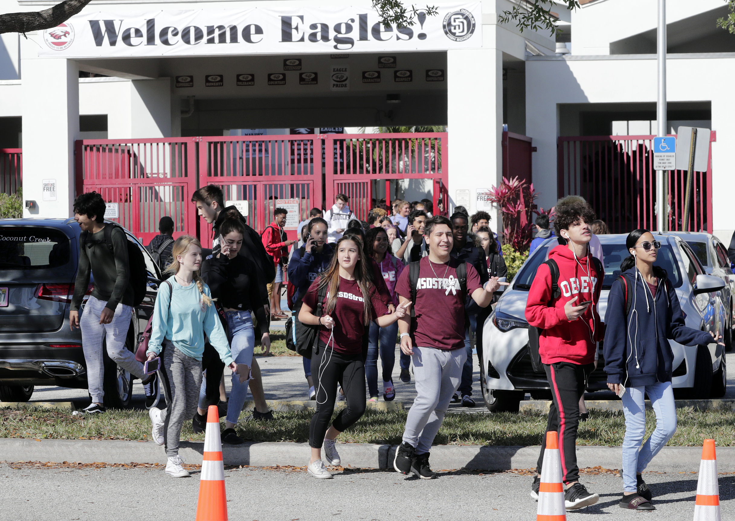 Students walk out of class across America on one-month anniversary of Florida school shooting: Watch