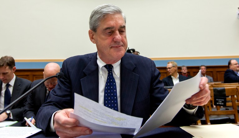 Robert Mueller reads some papers before a hearing begins in Washington, D.C.