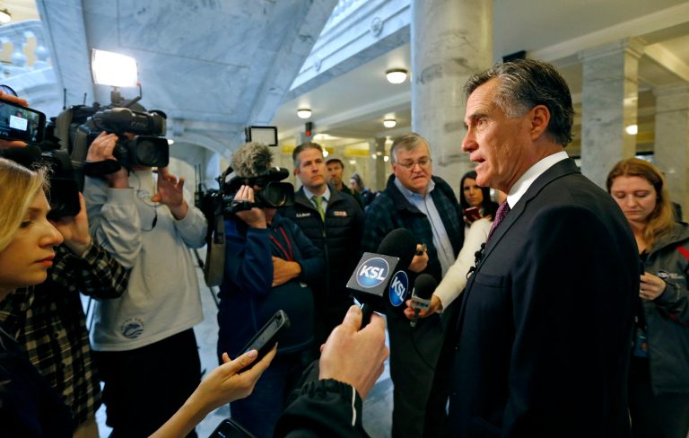 Former Republican presidential nominee Mitt Romney speaks to reporters on March 15 at the Utah State Capitol in Salt Lake City.