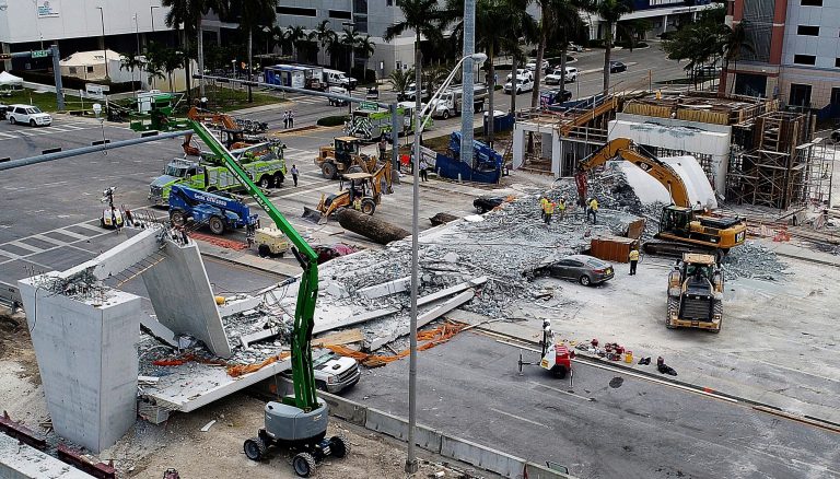 Recovery operations continue Saturday morning, March 17, 2018, at the site of the Florida International University-Sweetwater University bridge in the Miami area that collapsed during construction earlier in the week. 