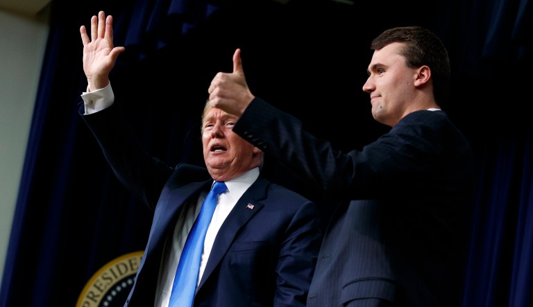 President Trump stands with Charlie Kirk after speaking to the Generation Next Summit in the South Court Auditorium on the White House complex, Thursday, March 22, 2018, in Washington.