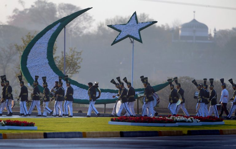 Members of Pakistan military band arrive to attend a military parade in Islamabad, Pakistan, Friday, March 23, 2018.