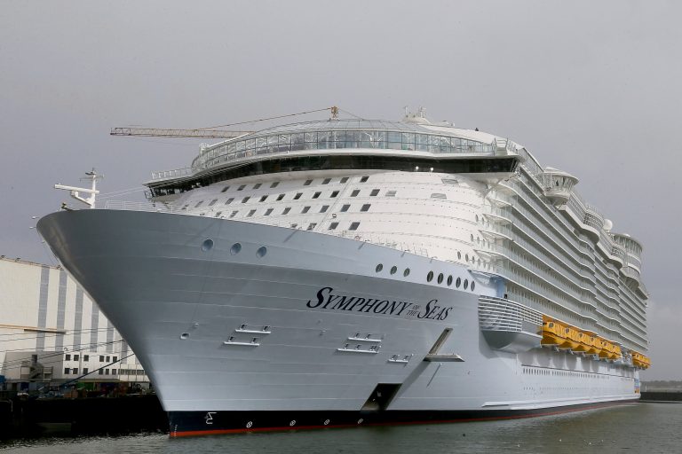 The Symphony of the Seas docks at Saint Nazaire port, western France, Friday, March 23, 2018. Royal Caribbean International took delivery of the much-awaited, 228,081-ton Symphony of the Seas from the French shipyard STX. Harmony of the Seas is the world's largest cruise ship.