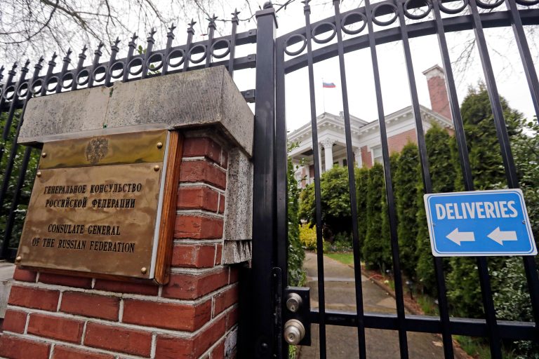 A metal fence surrounds the residence of Russia's consul general in Seattle. The United States and more than a dozen European nations kicked out Russian diplomats on Monday and the Trump administration ordered Russia's consulate in Seattle to close, as the West sought joint punishment for Moscow's alleged role in poisoning an ex-spy in Britain.