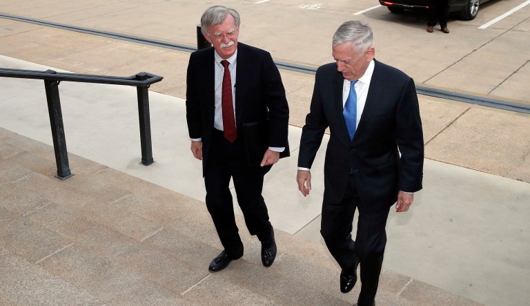 President Donald Trump's pick for national security adviser John Bolton, left, walks up the steps with Defense Secretary Jim Mattis, as Bolton arrives at the Pentagon, Thursday, March 29, 2018, in Washington.