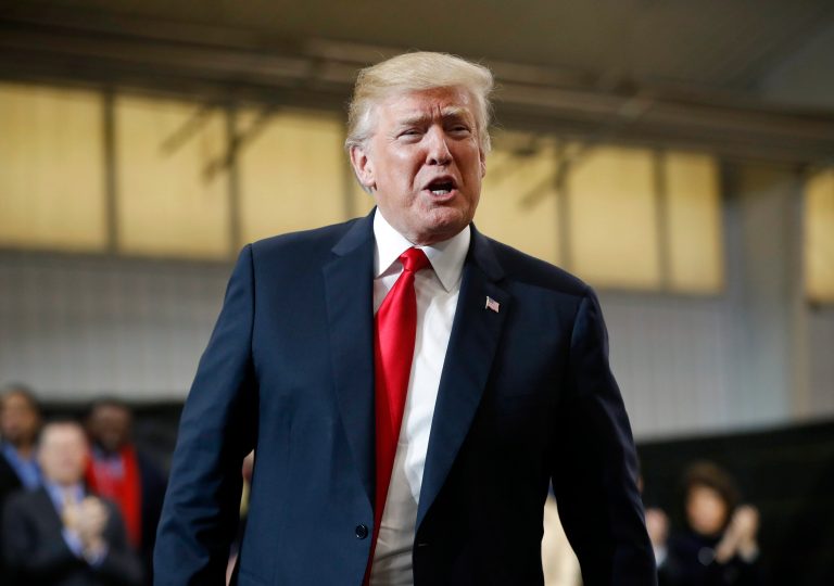 President Trump walks onto stage to speak at Local 18 Richfield Training Facility on Thursday in Richfield, Ohio.