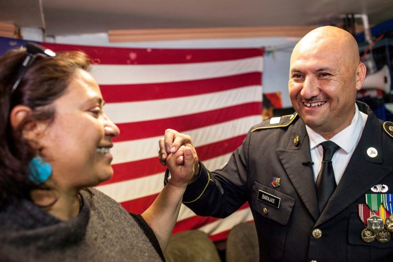 Hector Barajas-Varela, a deported U.S. Army veteran, right, celebrates with Norma Chavez-Peterson, executive director of the ACLU of San Diego and Imperial counties, after Barajas-Varela was delivered an announcement granting his American citizenship in Tijuana, Mexico, Thursday, March 29, 2018. Barajas came to the United States from Mexico when he was 7 years old and, after graduating high school, served in the U.S. Army from 1995 to 2001, when he was honorably discharged, according to a federal lawsuit filed in December seeking citizenship. He was a member of the 82nd Airborne Division and received several military accolades.