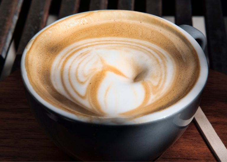 Steamed milk floats atop a cup of coffee at a cafe in Los Angeles. Superior Court Judge Elihu Berle wrote in a proposed ruling Wednesday that Starbucks and other coffee companies failed to show that the threat from a chemical compound produced in the roasting process was insignificant. At the center of the dispute is acrylamide, a carcinogen found in many cooked foods, that is produced during the roasting process. 