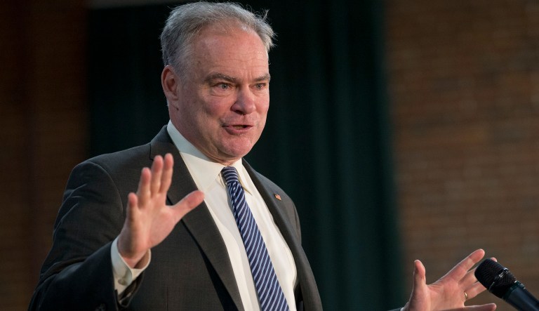 Sen. Tim Kaine gestures during a campaign kickoff rally in Richmond, Va., Monday, April 2, 2018. 