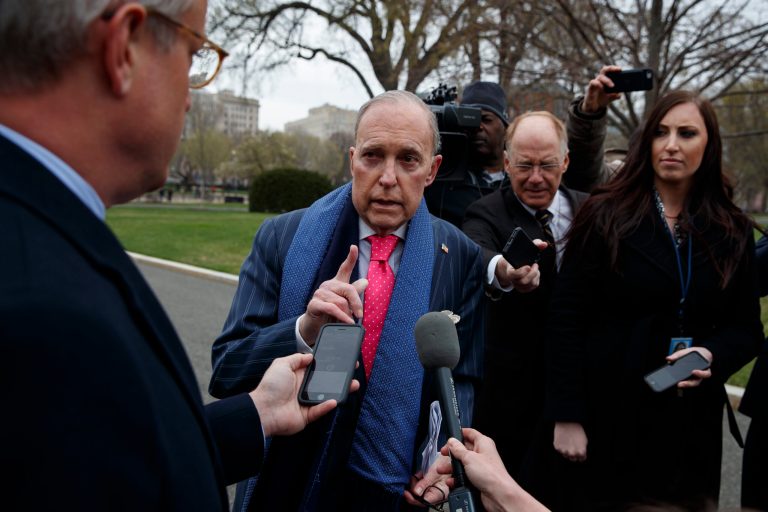 White House chief economic adviser Larry Kudlow talks to reporters outside the White House, Friday, April 6, 2018, in Washington.