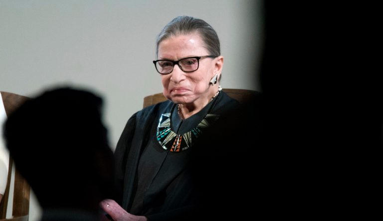 Supreme Court Justice Ruth Bader Ginsburg looks at U.S. citizenship candidates during swearing in ceremony for new American citizens, Tuesday, April 10, 2018, in New York. 
