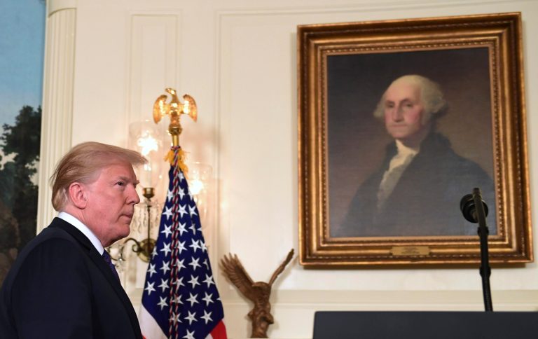 President Donald Trump arrives to speak in the Diplomatic Reception Room of the White House on Friday, April 13, 2018, in Washington, about the United States' military response to Syria's chemical weapon attack on April 7.