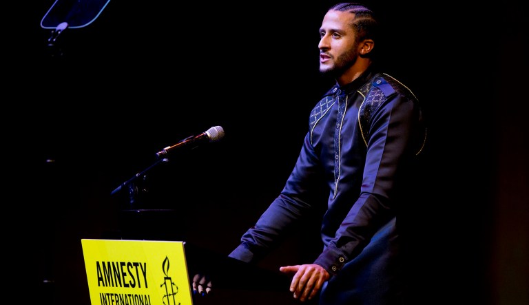 Former NFL quarterback and social justice activist Colin Kaepernick speeches after receiving the Amnesty International Ambassador of Conscience Award for 2018 in Amsterdam, Saturday April 21, 2018. Kaepernick became a controversial figure when refusing to stand for the national anthem, instead he knelt to protest racial inequality and police brutality. 