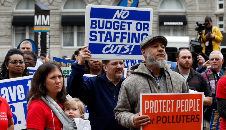 Workers with the American Federation of Government Employees union protest outside of the Environmental Protection Agency headquarters in D.C.