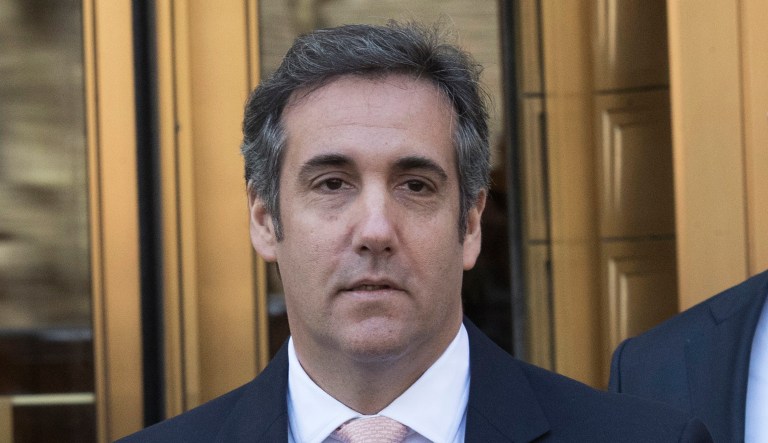 Michael Cohen, left, President Donald Trump's personal attorney, leaves federal court in New York, Thursday, April 26, 2018. President Donald Trump said that Cohen, his personal attorney, represented him "with this crazy Stormy Daniels deal," after previously denying any knowledge of a payment Cohen made to the porn actress who alleges an affair with Trump.