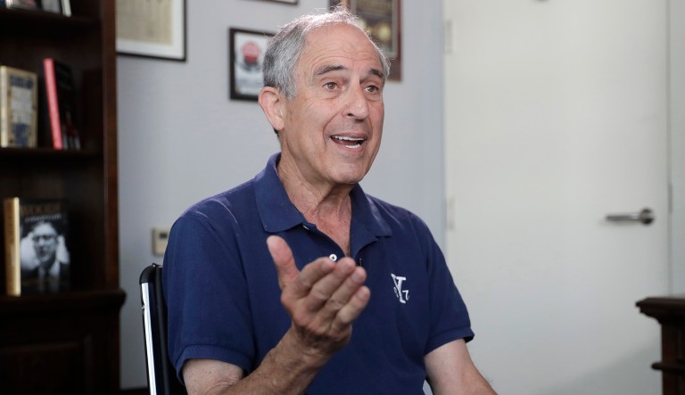 Attorney Lanny Davis speaks during an AP interview in his K Street office in Washington. 