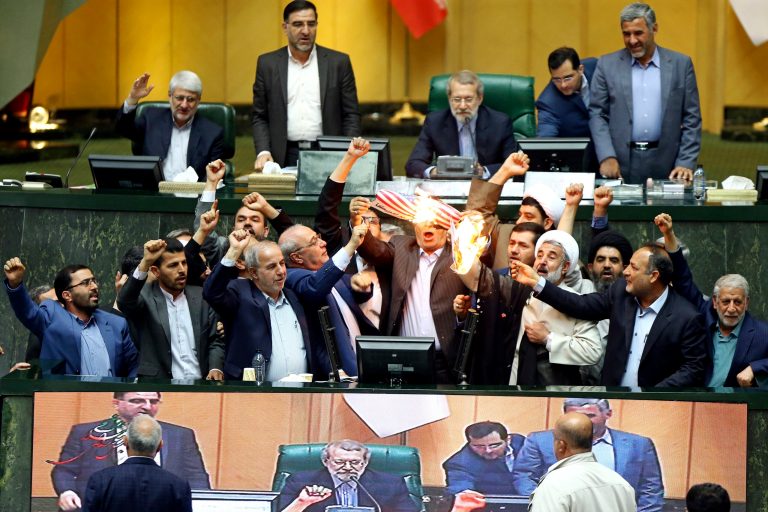 Iranian lawmakers burn American flag after Trump withdraws from nuclear deal