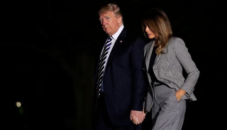 President Donald Trump with first lady Melania Trump returns to the White House in Washington, Thursday, May 10, 2018, after greeting three freed Americans, detained in North Korea for over a year.