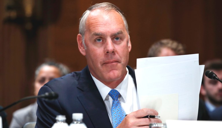 Interior Secretary Ryan Zinke arrives for a hearing on Capitol Hill in Washington.