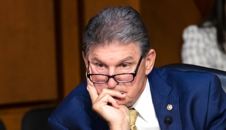 Sen. Joe Manchin, D-W.Va., listens during a hearing on Capitol Hill in Washington.