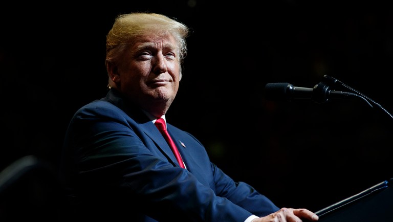 President Donald Trump pauses as he speaks at the North Side Gymnasium in Elkhart, Ind., Thursday, May 10, 2018, during a campaign rally.