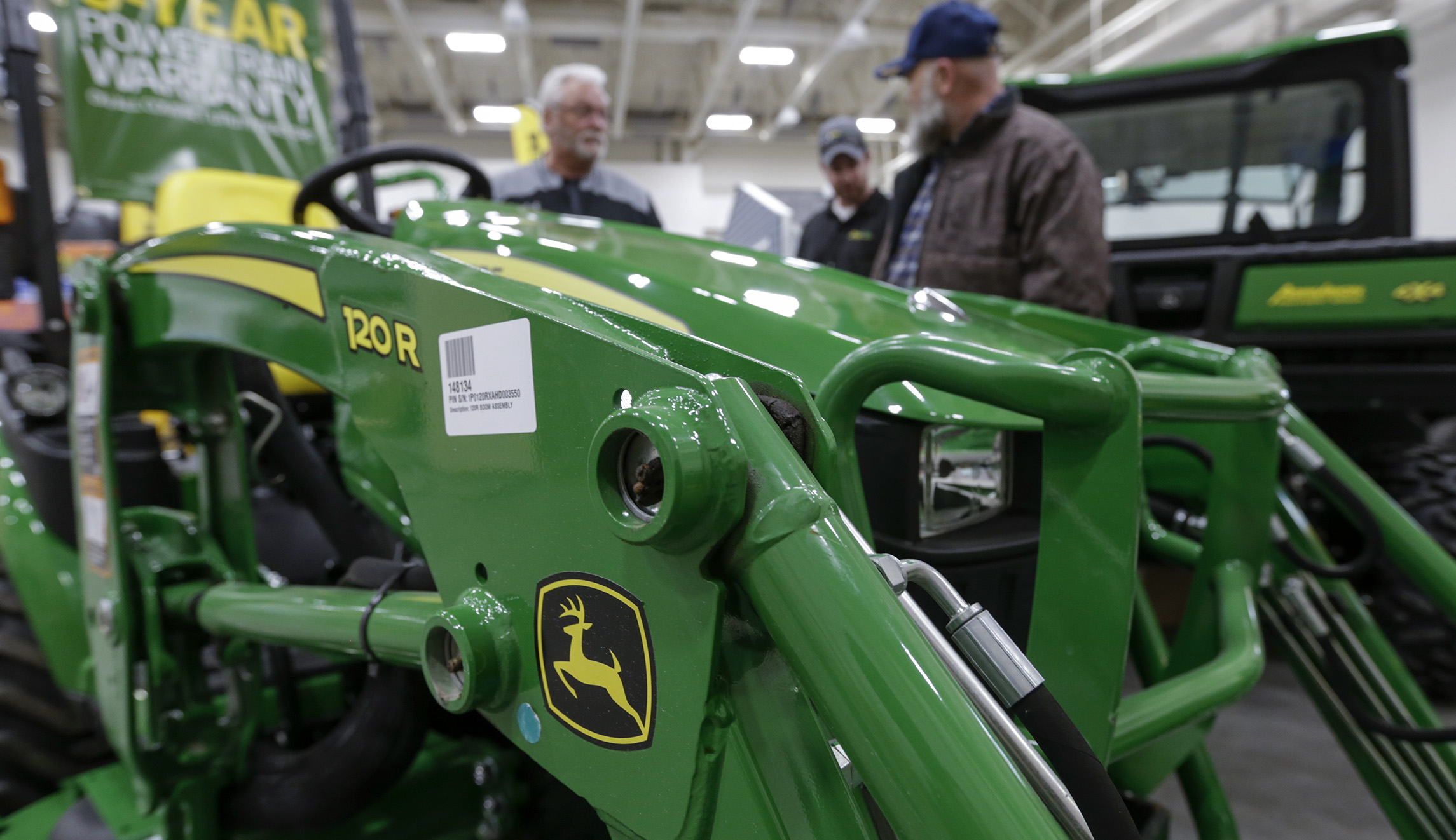 John Deere predicts battered US farmers will cut purchases by $464 million