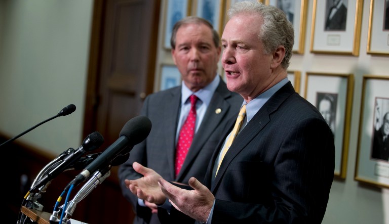 Sen. Chris Van Hollen, D-Md., accompanied by Ranking Member Sen. Tom Udall, D-N.M., left, speaks during a news conference following testimony by Environmental Protection Agency Administrator Scott Pruitt before a Senate Appropriations subcommittee on the Interior, Environment, and Related Agencies Capitol Hill in Washington, Wednesday, May 16, 2018. Pruitt went before a Senate panel as he faces a growing number of federal ethics investigations over his lavish spending on travel and security. 