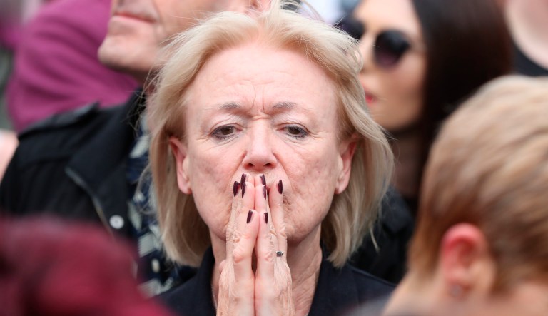 A campaigner listens to the announcement in Dublin, Ireland, Saturday, May 26, 2018, of the final referendum results as Ireland has voted to repeal the 8th Amendment of the Irish Constitution which prohibits abortions unless a mother's life is in danger. 