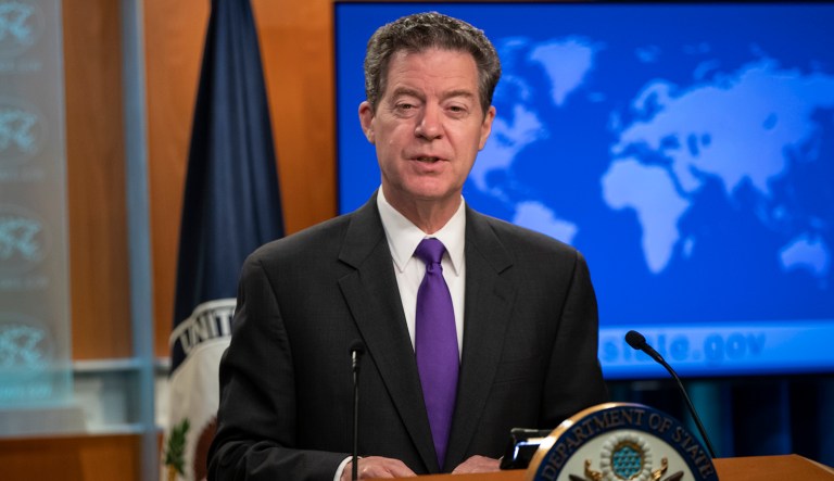 Ambassador-at-Large for International Religious Freedom Sam Brownback speaks to reporters.