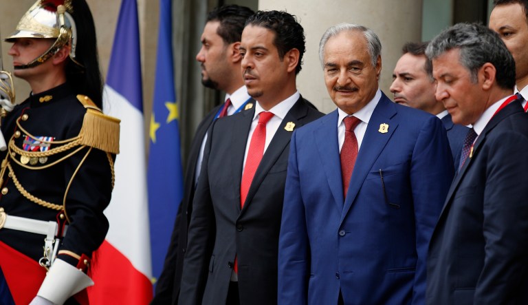 Libya Chief of Staff, Marshall Khalifa Haftar, third left, leaves after an International Conference on Libya at the Elysee Palace, in Paris, France, Tuesday May 29, 2018.