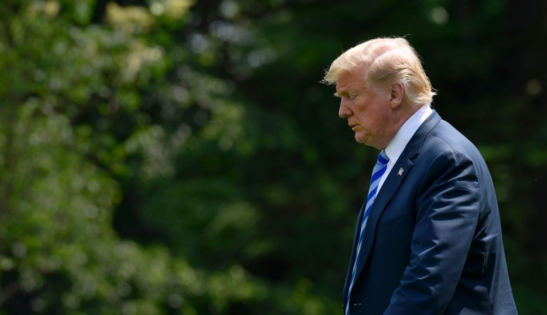 President Trump walks from the Oval Office on the South Lawn. 