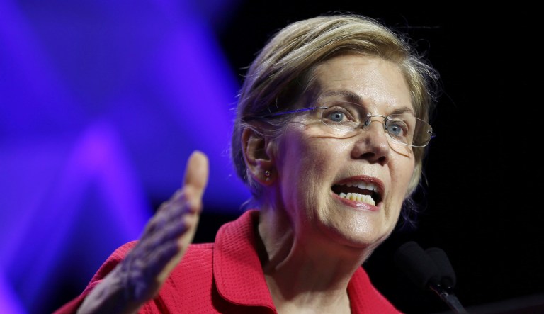 Sen. Elizabeth Warren speaks at the 2018 Massachusetts Democratic Party Convention in Worcester, Mass. 