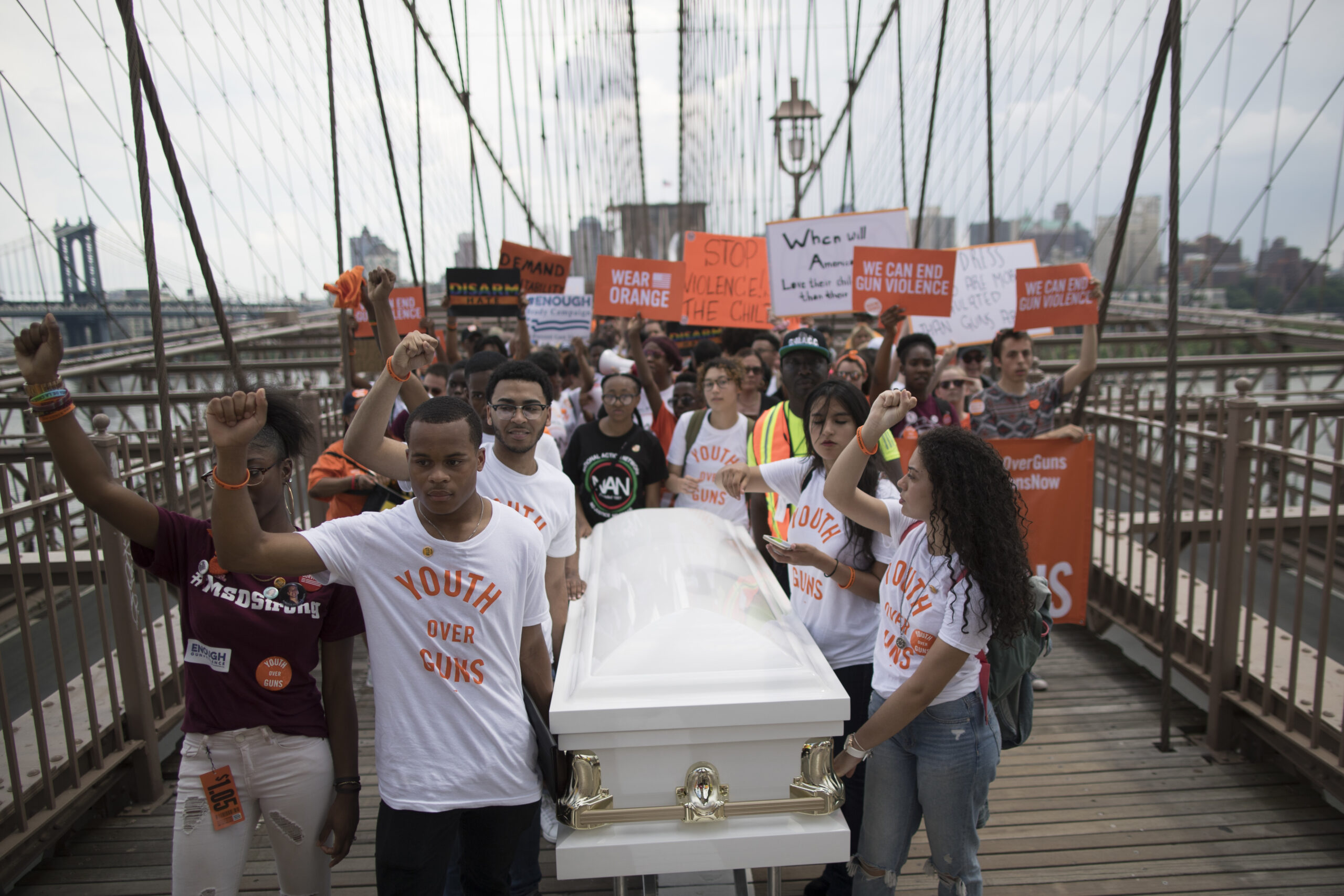 Young people march across Brooklyn Bridge, through NYC to protest gun violence