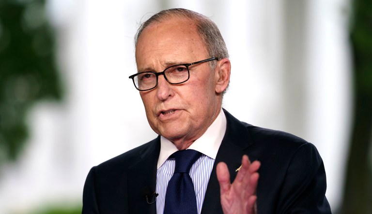 White House chief economic adviser Larry Kudlow speaks during a television interview outside the West Wing of the White House, in Washington.