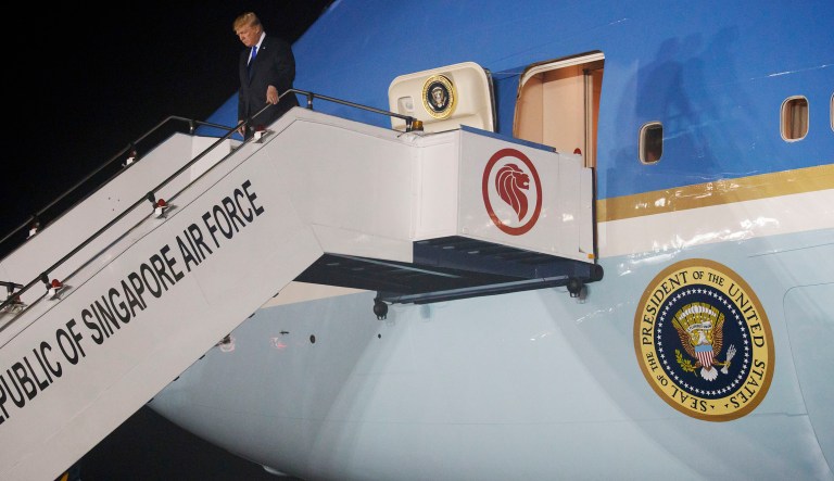 President Donald Trump arrives at Paya Lebar Air Base for a summit with North Korea's leader Kim Jong Un, Sunday, June 10, 2018, in Singapore.
