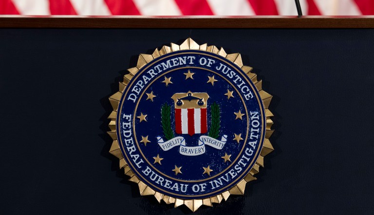 The FBI seal is seen before FBI Director Christopher Wray news conference on the inspector general's report at FBI headquarters on Thursday, June 14, 2018, in Washington.